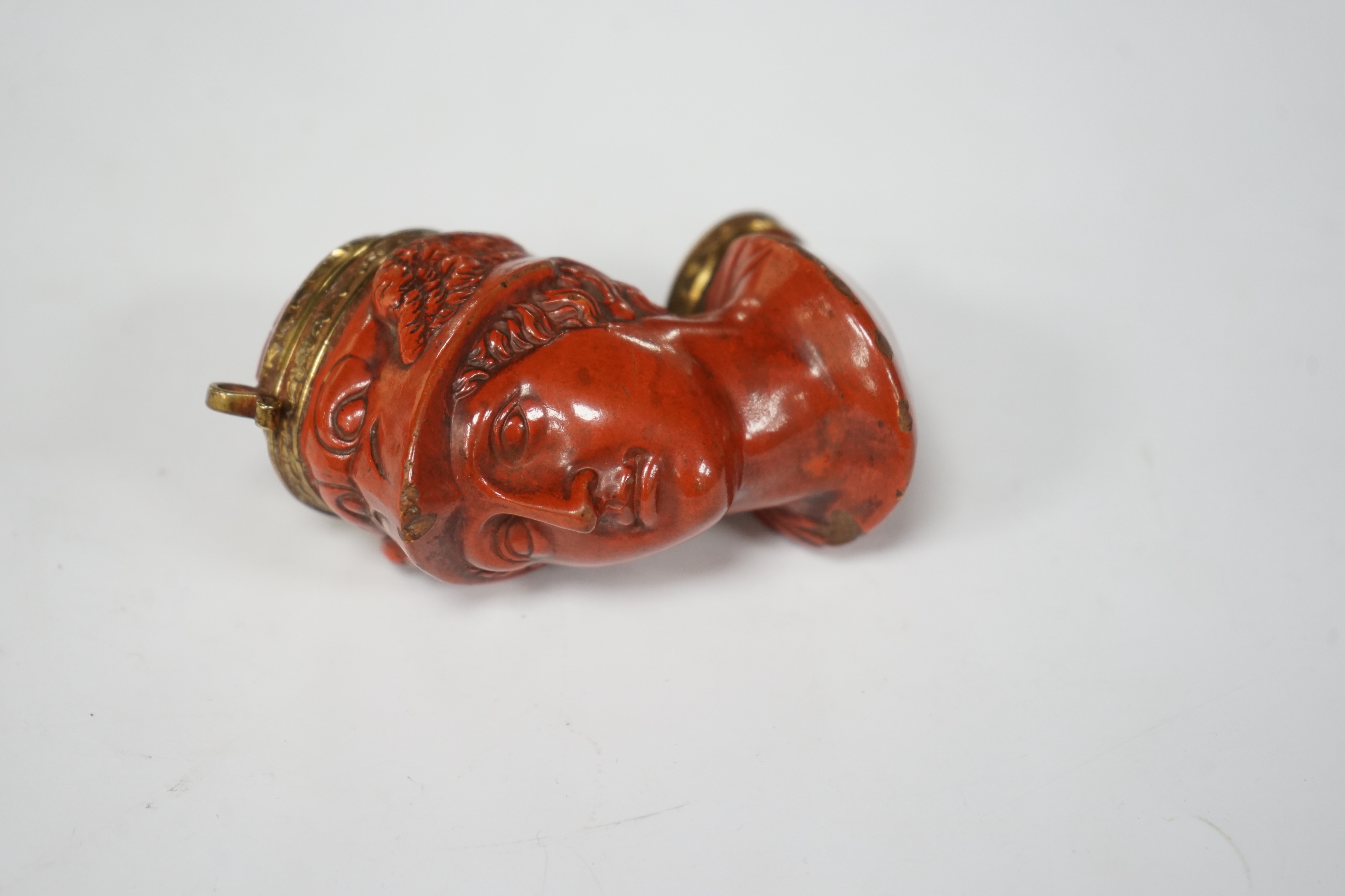 A 19th-century French terracotta pipe modelled as the bust of Hermes, approximately 10cm high